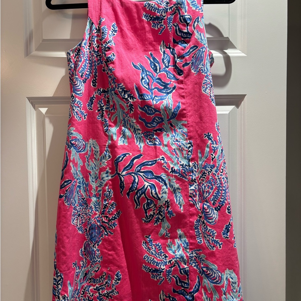 Vibrant Pink Sleeveless Dress with Blue Floral Pattern